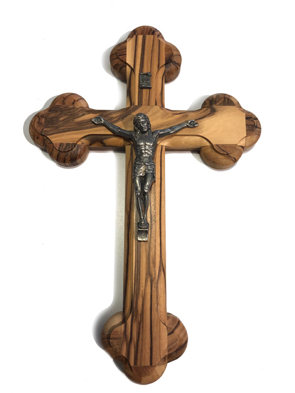 Croce sagomata con Cristo in metallo